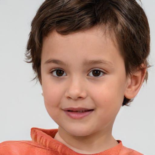 Joyful white child male with short  brown hair and brown eyes