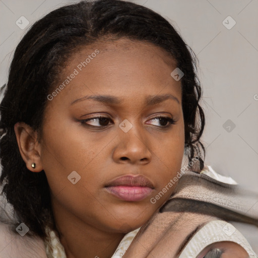 Neutral black young-adult female with medium  brown hair and brown eyes