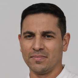 Neutral white adult male with short  black hair and brown eyes