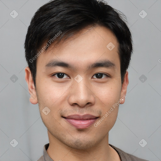 Joyful white young-adult male with short  black hair and brown eyes