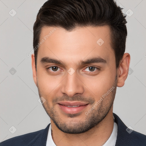 Joyful white young-adult male with short  brown hair and brown eyes