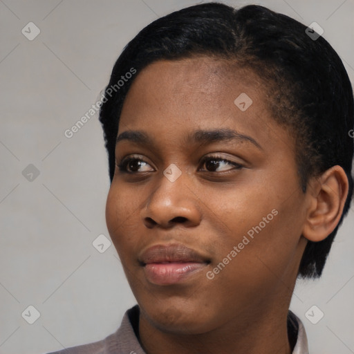 Neutral black young-adult female with short  black hair and brown eyes