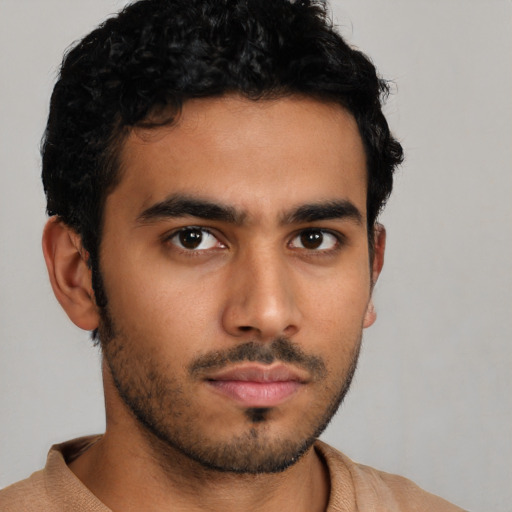 Neutral latino young-adult male with short  brown hair and brown eyes