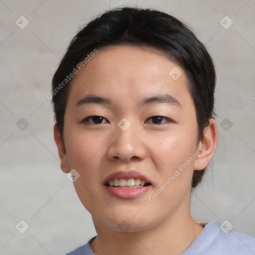 Joyful asian young-adult female with short  brown hair and brown eyes