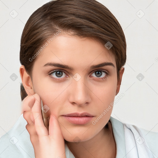 Neutral white young-adult female with medium  brown hair and brown eyes