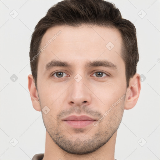 Neutral white young-adult male with short  brown hair and brown eyes