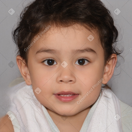 Joyful white child male with short  brown hair and brown eyes