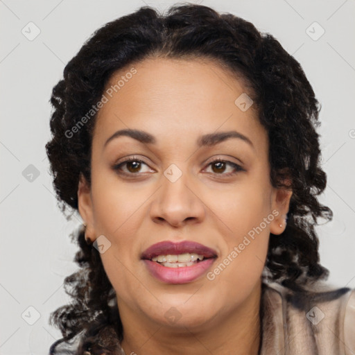 Joyful black young-adult female with long  brown hair and brown eyes