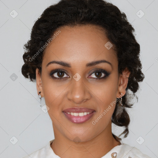 Joyful black young-adult female with medium  brown hair and brown eyes