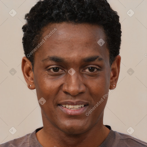 Joyful black young-adult male with short  black hair and brown eyes