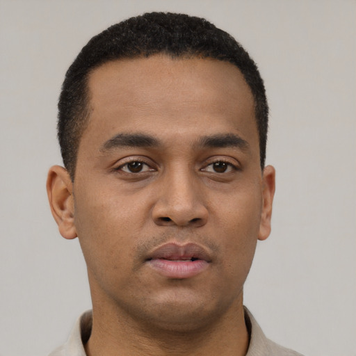 Neutral latino young-adult male with short  brown hair and brown eyes