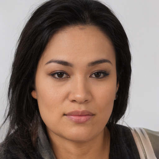 Neutral asian young-adult female with long  brown hair and brown eyes