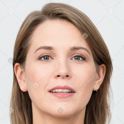 Joyful white young-adult female with long  brown hair and grey eyes