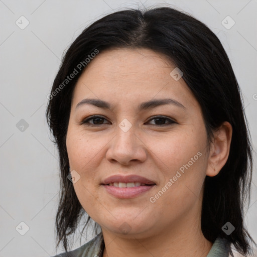 Joyful asian young-adult female with medium  brown hair and brown eyes