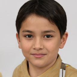 Joyful white child male with short  brown hair and brown eyes