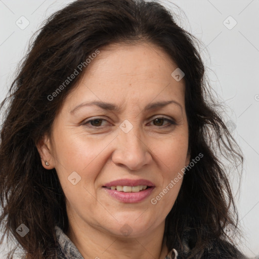 Joyful white adult female with long  brown hair and brown eyes
