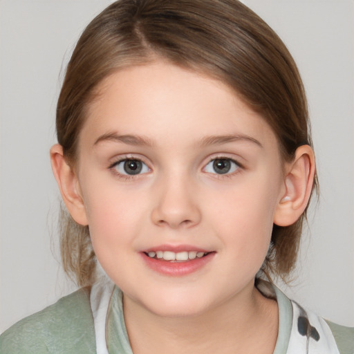 Joyful white child female with medium  brown hair and brown eyes