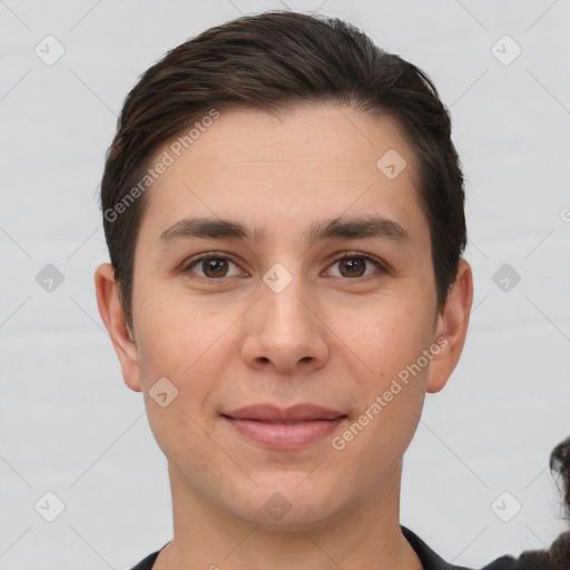 Joyful white young-adult male with short  brown hair and brown eyes