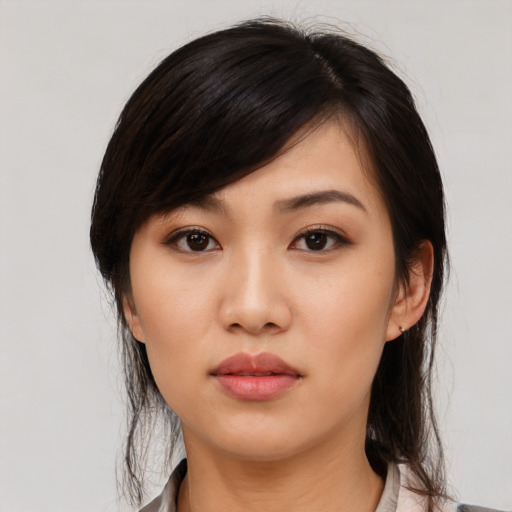 Neutral asian young-adult female with medium  black hair and brown eyes