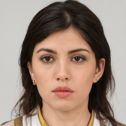 Neutral white young-adult female with medium  brown hair and brown eyes