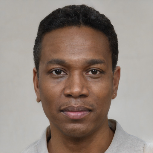 Neutral black young-adult male with short  black hair and brown eyes
