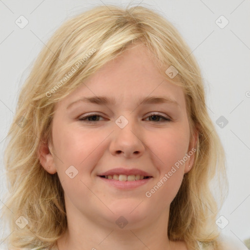 Joyful white young-adult female with medium  brown hair and blue eyes