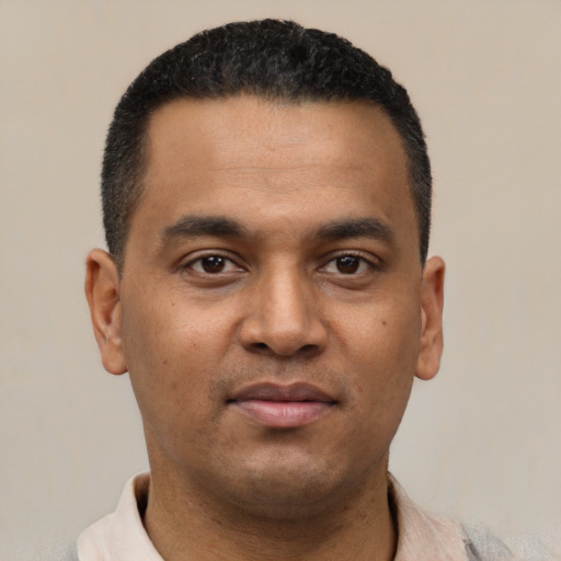 Neutral latino young-adult male with short  black hair and brown eyes