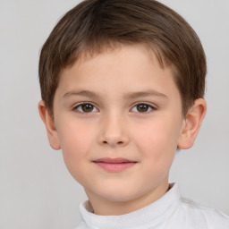 Joyful white child female with short  brown hair and brown eyes