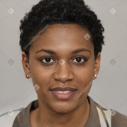 Joyful black young-adult female with short  black hair and brown eyes