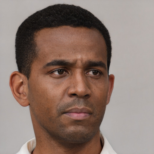 Neutral black young-adult male with short  brown hair and brown eyes
