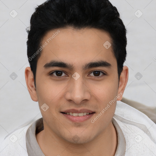 Joyful latino young-adult male with short  black hair and brown eyes