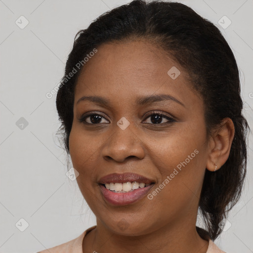 Joyful black young-adult female with medium  brown hair and brown eyes