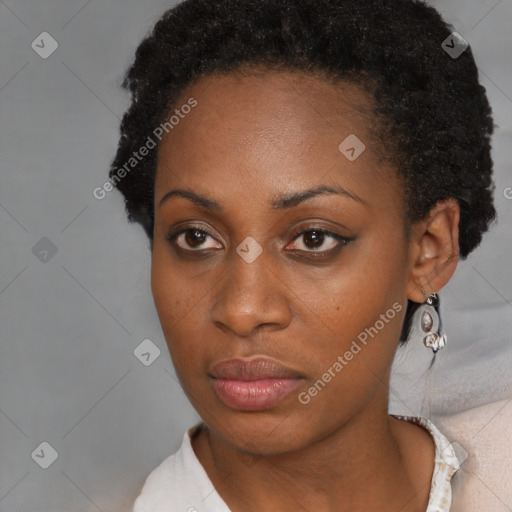 Neutral black young-adult female with short  brown hair and brown eyes