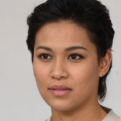 Neutral latino young-adult female with medium  black hair and brown eyes