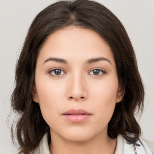 Neutral white young-adult female with medium  brown hair and brown eyes