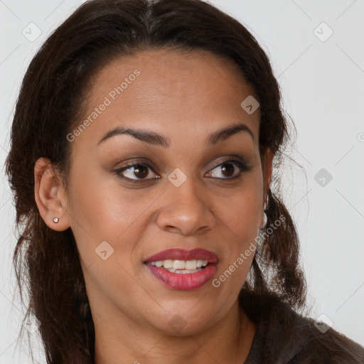 Joyful latino young-adult female with long  brown hair and brown eyes