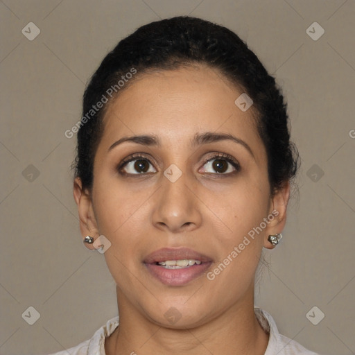 Joyful latino young-adult female with short  brown hair and brown eyes