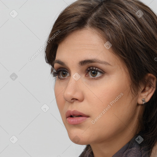 Neutral white young-adult female with medium  brown hair and brown eyes