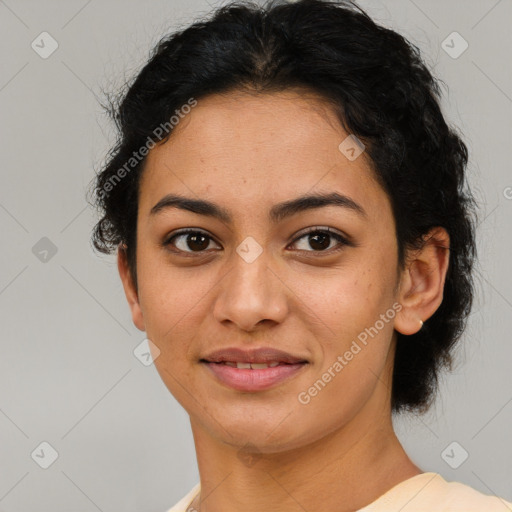 Joyful latino young-adult female with short  brown hair and brown eyes