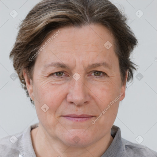 Joyful white adult female with short  brown hair and brown eyes