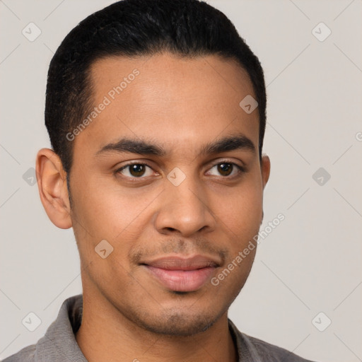 Joyful latino young-adult male with short  black hair and brown eyes