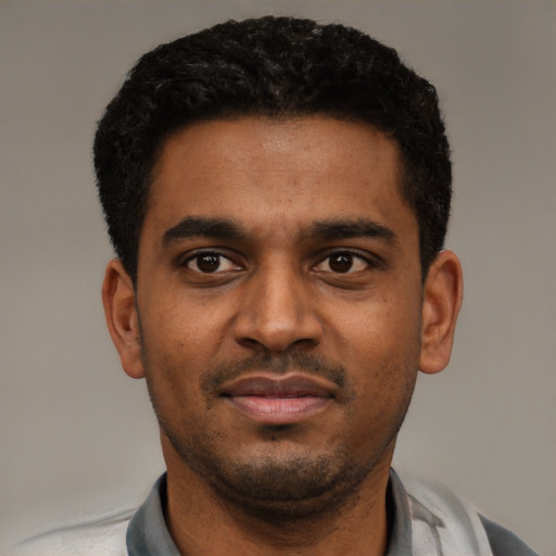 Neutral black young-adult male with short  black hair and brown eyes