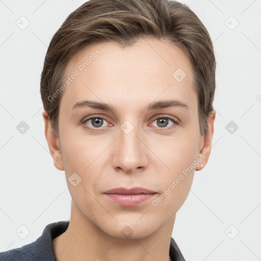 Joyful white young-adult female with short  brown hair and grey eyes