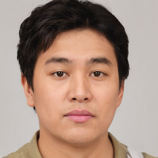 Neutral asian young-adult male with short  brown hair and brown eyes