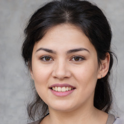 Joyful white young-adult female with medium  brown hair and brown eyes