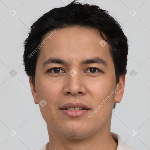 Joyful asian young-adult male with short  brown hair and brown eyes