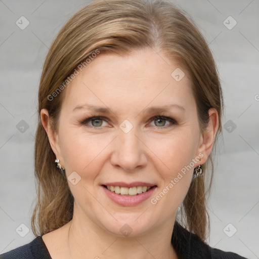 Joyful white young-adult female with medium  brown hair and grey eyes