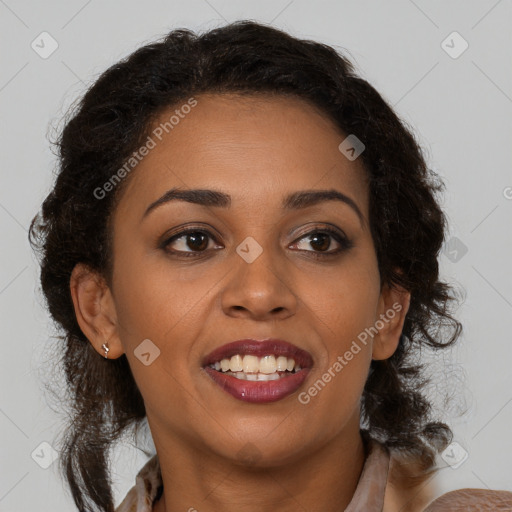 Joyful black young-adult female with medium  brown hair and brown eyes