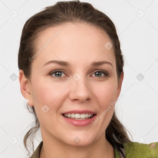 Joyful white young-adult female with medium  brown hair and grey eyes