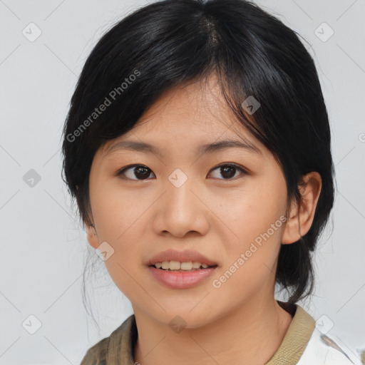 Joyful asian young-adult female with medium  black hair and brown eyes